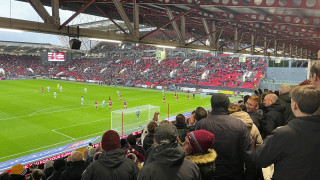 Burnley prepare to take a free kick in front of the Atyeo Stand late  in the second half at Ashton gate, players from both teams crowd the Bristol City penalty area.